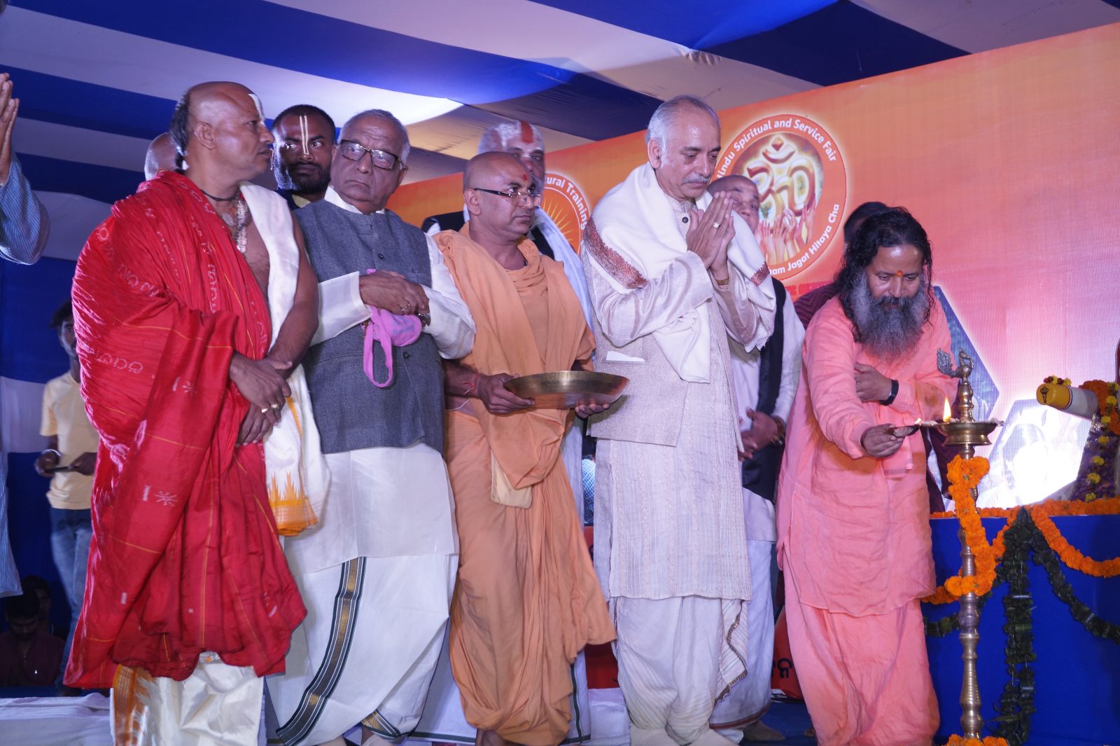 HSS Fair being inaugurated by Gajpati Shri Divya Singh Dev at Baramunda Ground, Bhubaneswar on 15 December 2016. Param Hamsa Swamy Prjna Nandji Maharaj  lights the lamp.