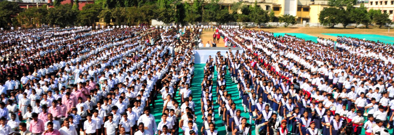 More than 25,000 school students unite at OUAT stadium to participate in 'Vande Mataram' chorus programme by IMCTOD on Dec 12, 2016
