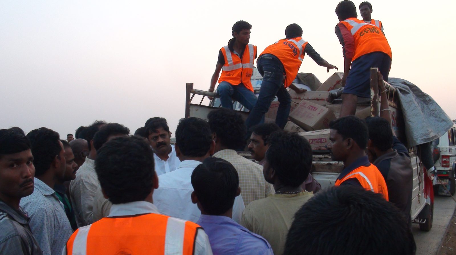 Murali Sharma sharing with Modi Sena activists during relief works across Ganjam Phailin hit areas